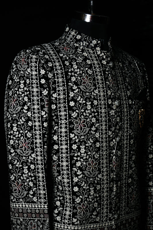 a black and white jacket on a mannequin