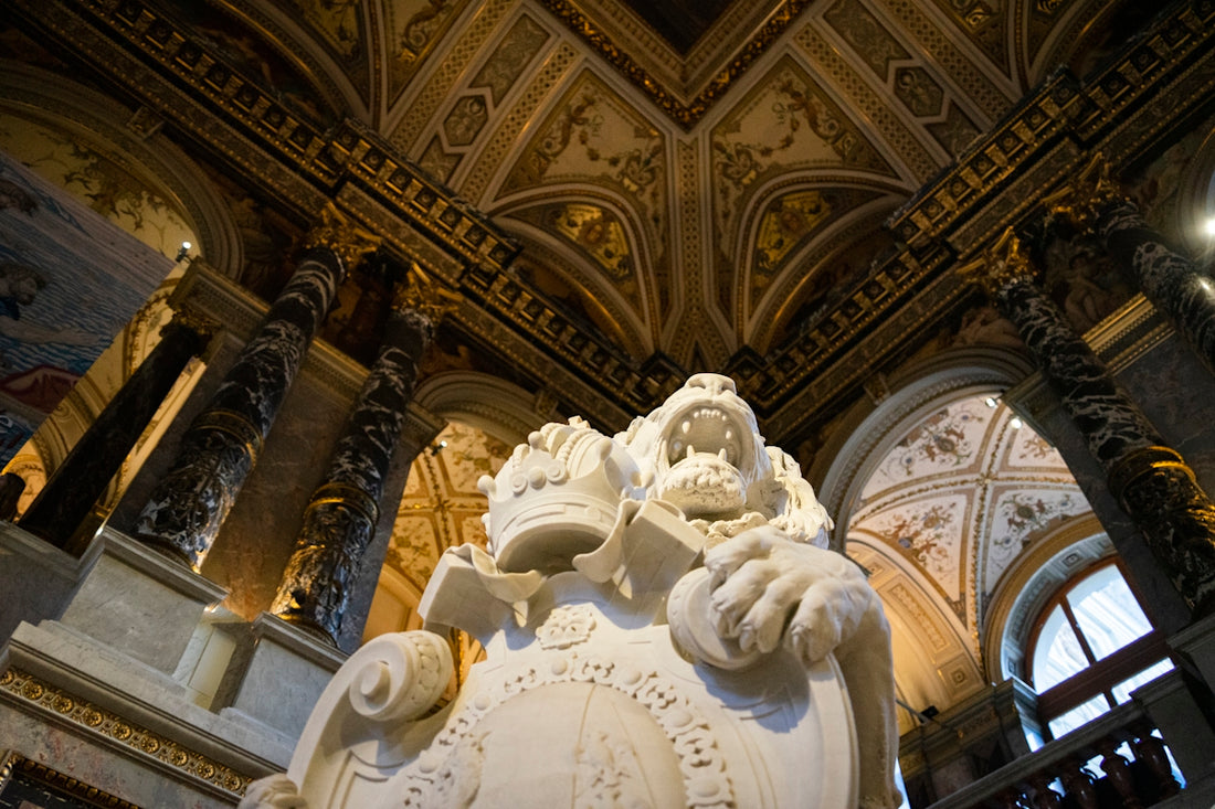 a large white statue in a large building